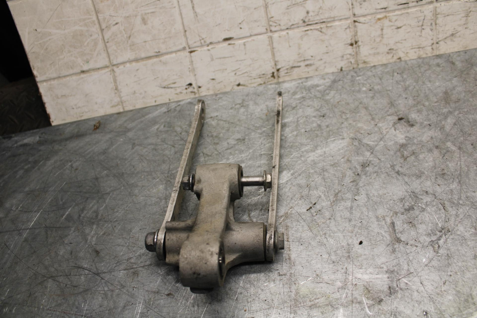 2009 Kawasaki Ninja ZX6R ZX600R REAR DOGBONE SHOCK LINKAGE LINK BB538