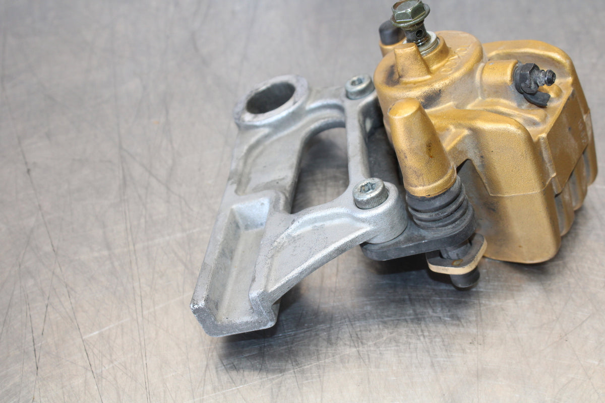 03-06 KAWASAKI Z1000 REAR BACK BRAKE CALIPER W MOUNT BRACKET BB164