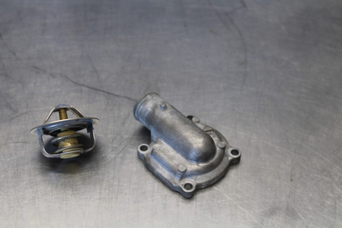 20-22 KAWASAKI NINJA ZX6R THERMOSTAT W HOUSING ASSEMBLY BB884