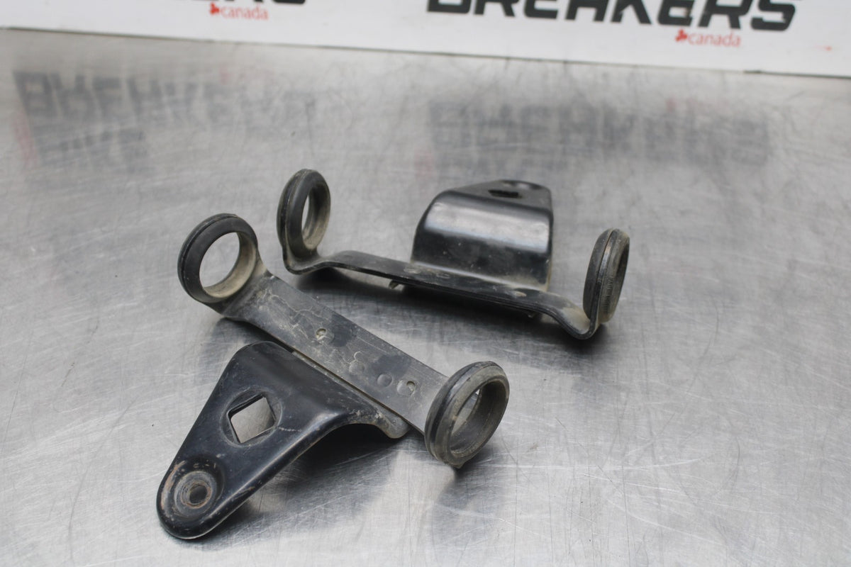 77 SUZUKI GS750 FRONT HEADLIGHT BRACKET PAIR FORK EAR BB779