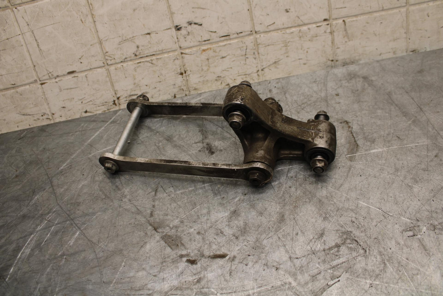 2005 Kawasaki Ninja ZX6R ZX636C REAR DOGBONE SHOCK LINKAGE LINK BB534