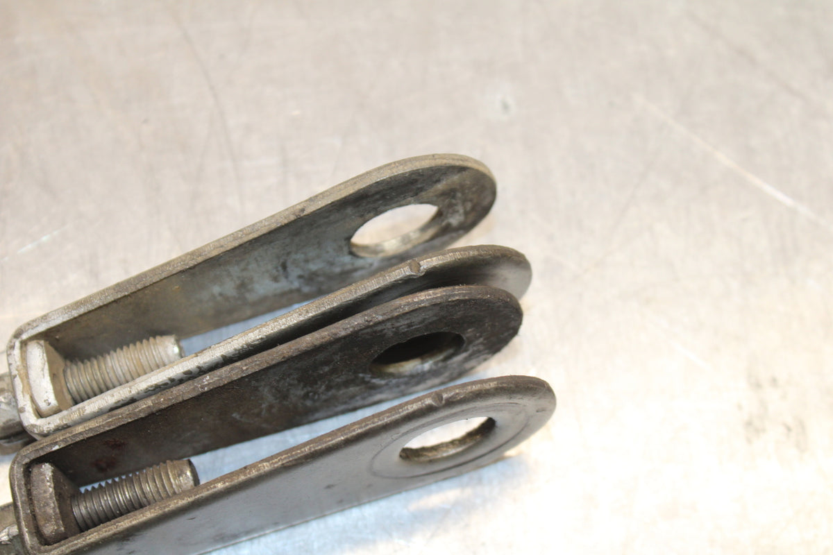 78 SUZUKI GS550E SWINGARM CHAIN TENSIONER ADJUSTMENT BRACKETS  BB133