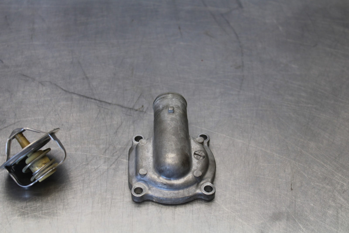 20-22 KAWASAKI NINJA ZX6R THERMOSTAT W HOUSING ASSEMBLY BB884