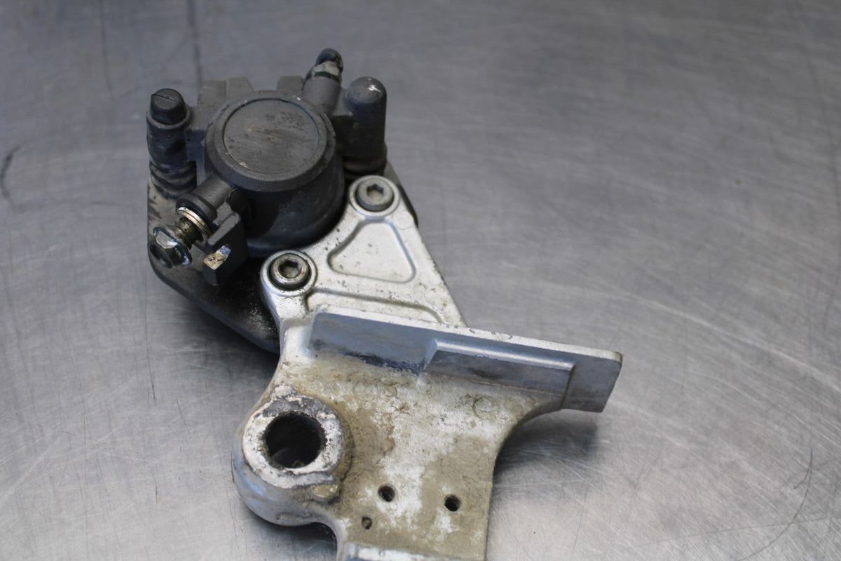 06 KAWASAKI KLR650 REAR BACK BRAKE CALIPER W MOUNT BRACKET BB919