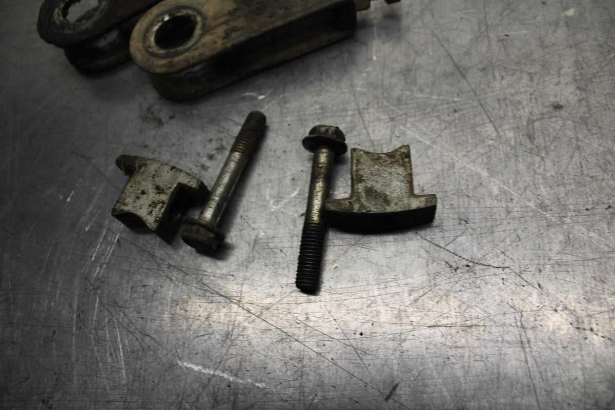 75 SUZUKI GT 550 SWINGARM CHAIN TENSIONER ADJUSTMENT BRACKETS  BB72