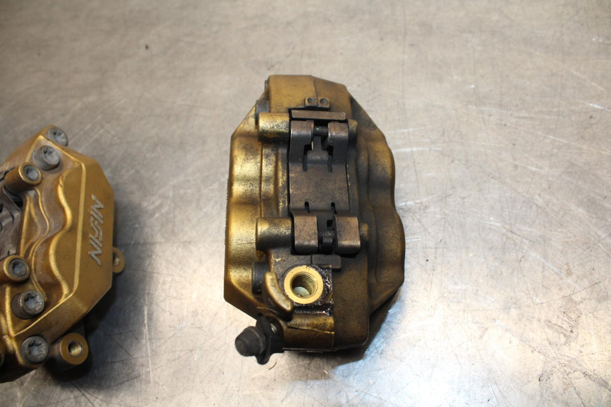 03-04 HONDA CBR600RR RIGHT LEFT FRONT BRAKE CALIPER SET PAIR CALIPERS BB614