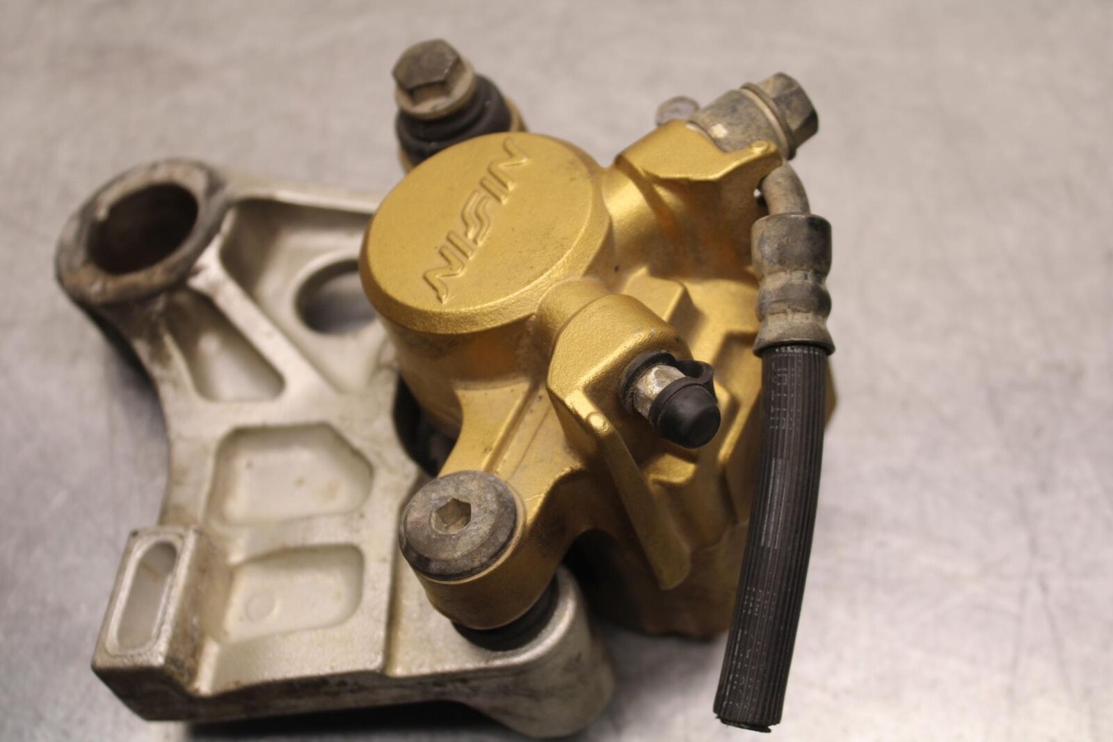 03-04 HONDA CBR600RR REAR BACK BRAKE CALIPER W MOUNT BRACKET  BB628