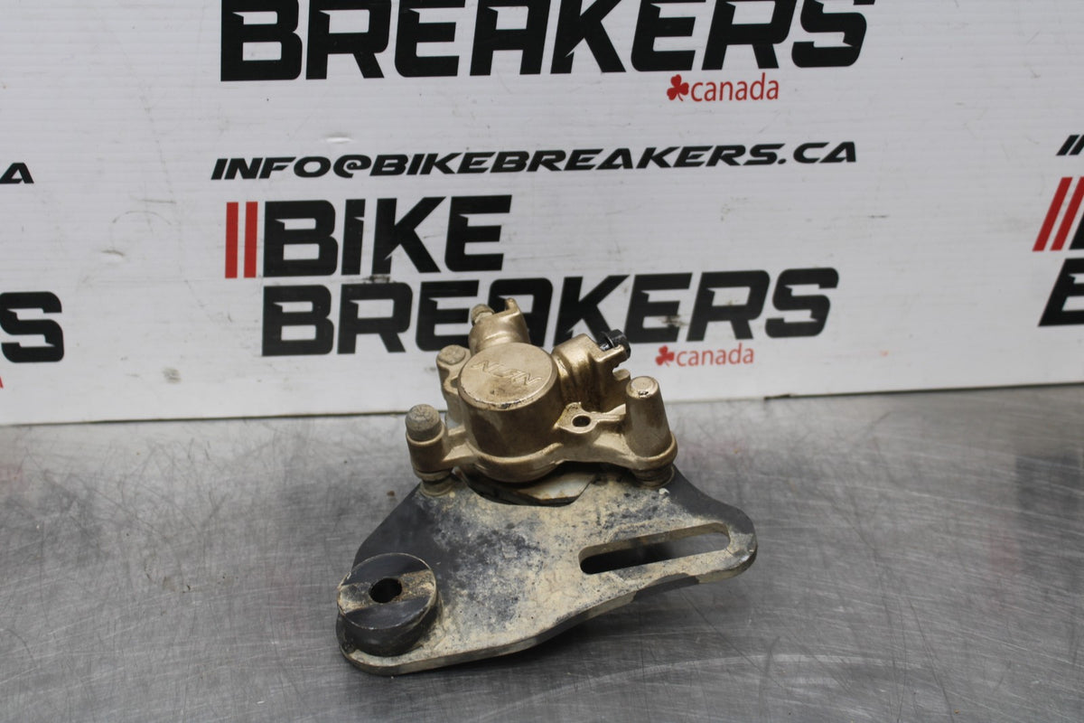 08 HONDA CBR125R REAR BACK BRAKE CALIPER W MOUNT BRACKET BB804