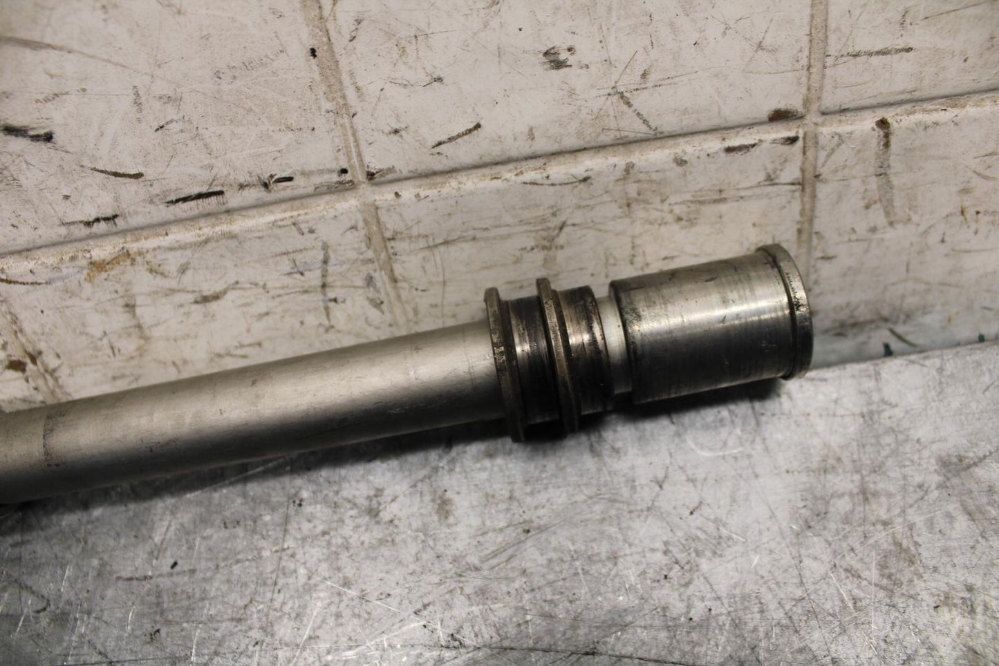 2009 Kawasaki Ninja ZX6R ZX600R FRONT WHEEL RIM AXLE PIVOT BOLT 41068-0034 BB538