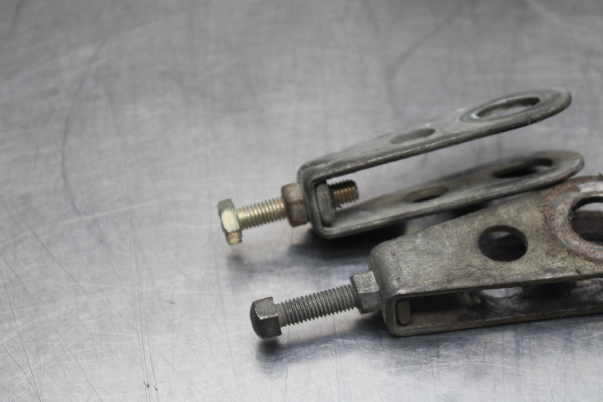 77 SUZUKI GS750 SWINGARM CHAIN TENSIONER ADJUSTMENT BRACKETS  BB779
