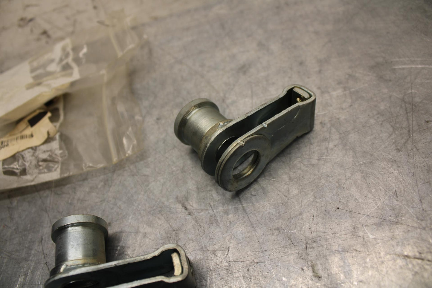 1978 Suzuki PE175  SWINGARM CHAIN TENSIONER BRACKETS 61410-41500 BB33