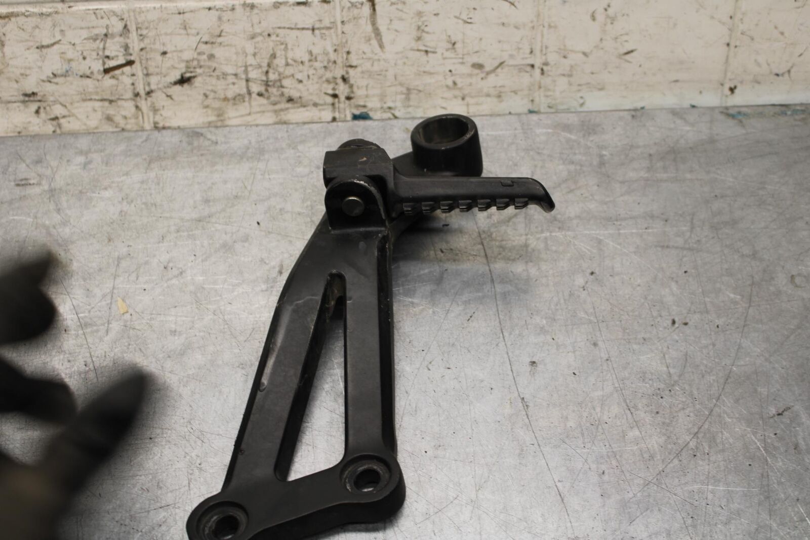 2000 Kawasaki Ninja ZX12R ZX1200A LEFT REAR BACK PASSENGER PEG 35063-1064