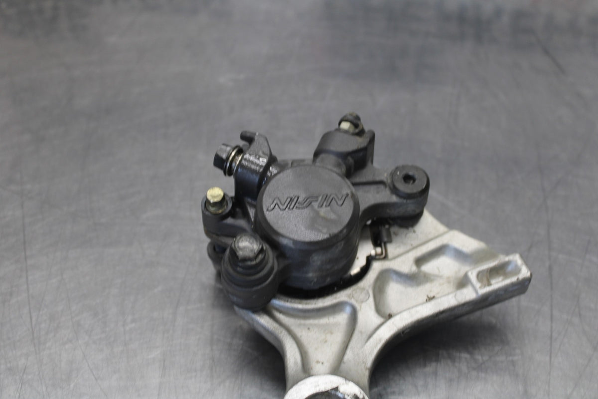 05-06 HONDA CBR600RR REAR BACK BRAKE CALIPER W MOUNT BRACKET BB893