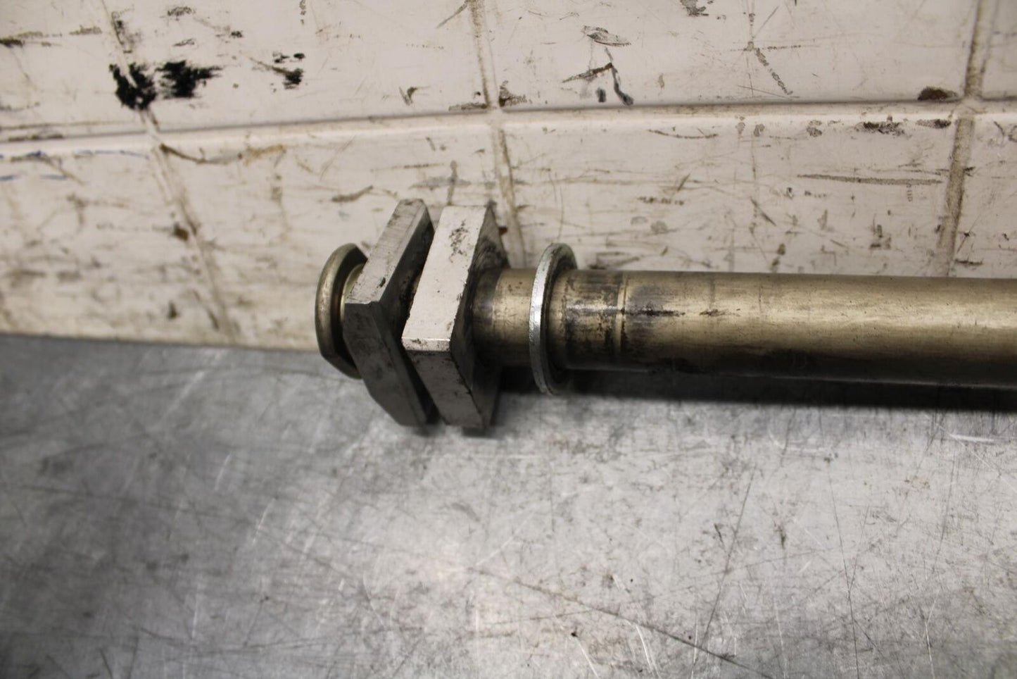 2009 Kawasaki Ninja ZX6R ZX600R REAR AXLE BACK WHEEL RIM PIVOT BOLT AXEL BB548