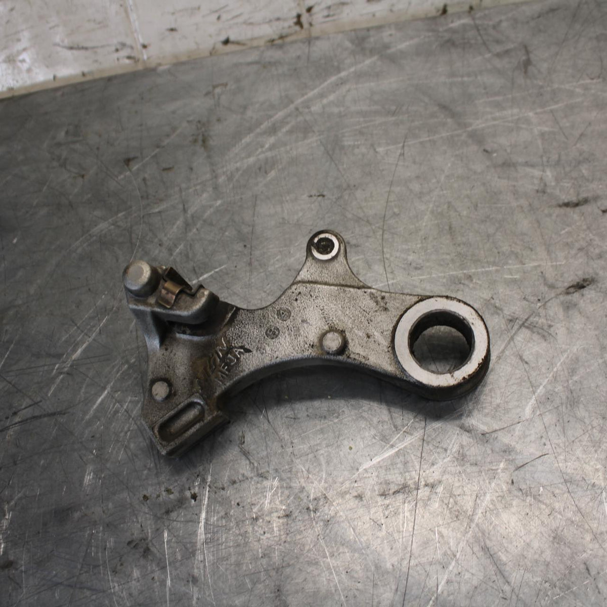 2011 Honda CBR600RR REAR BRAKE CALIPER HANGER BACK MOUNTING BRACKET BB520