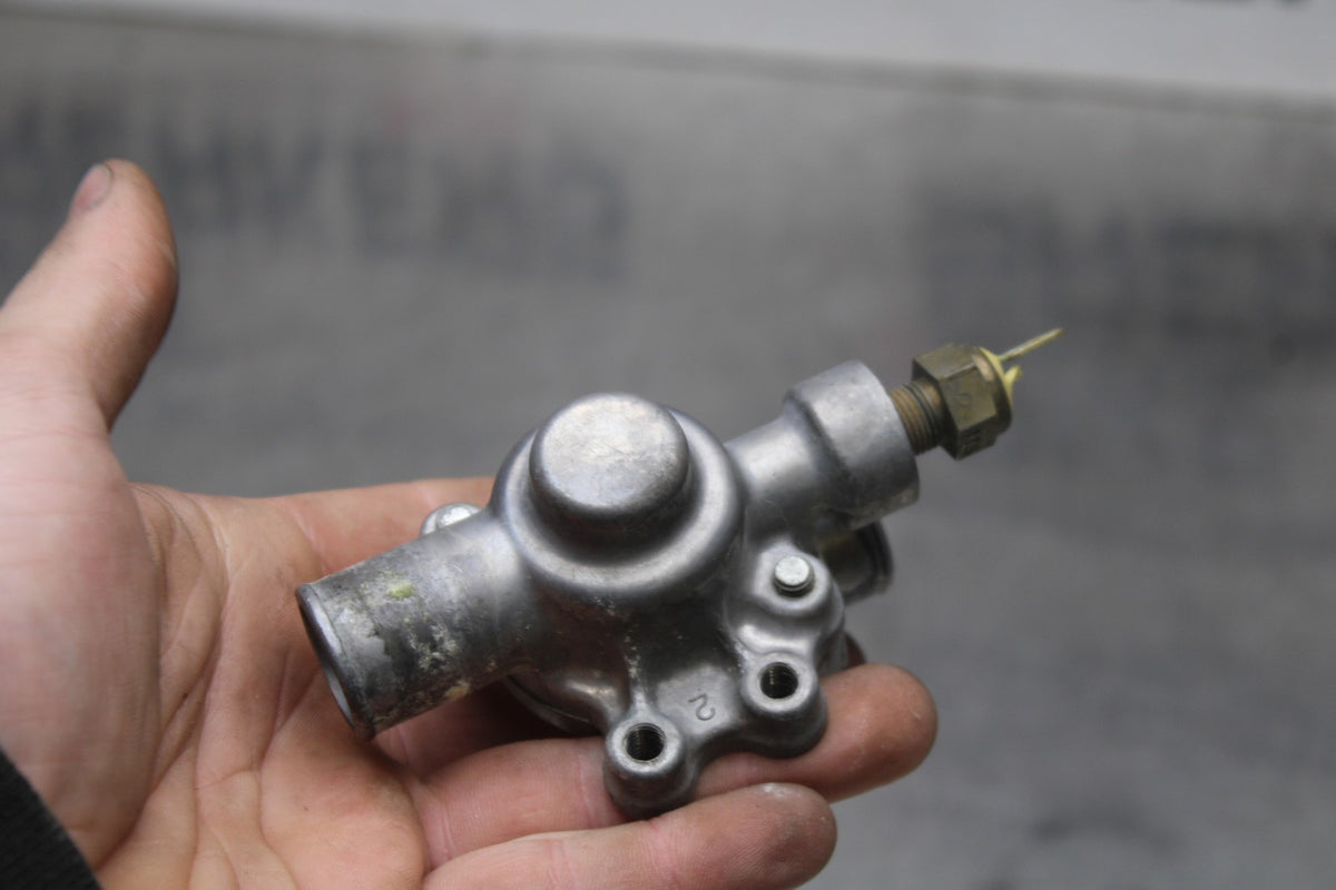 09 KAWASAKI NINJA 250R THERMOSTAT W HOUSING ASSEMBLY BB824