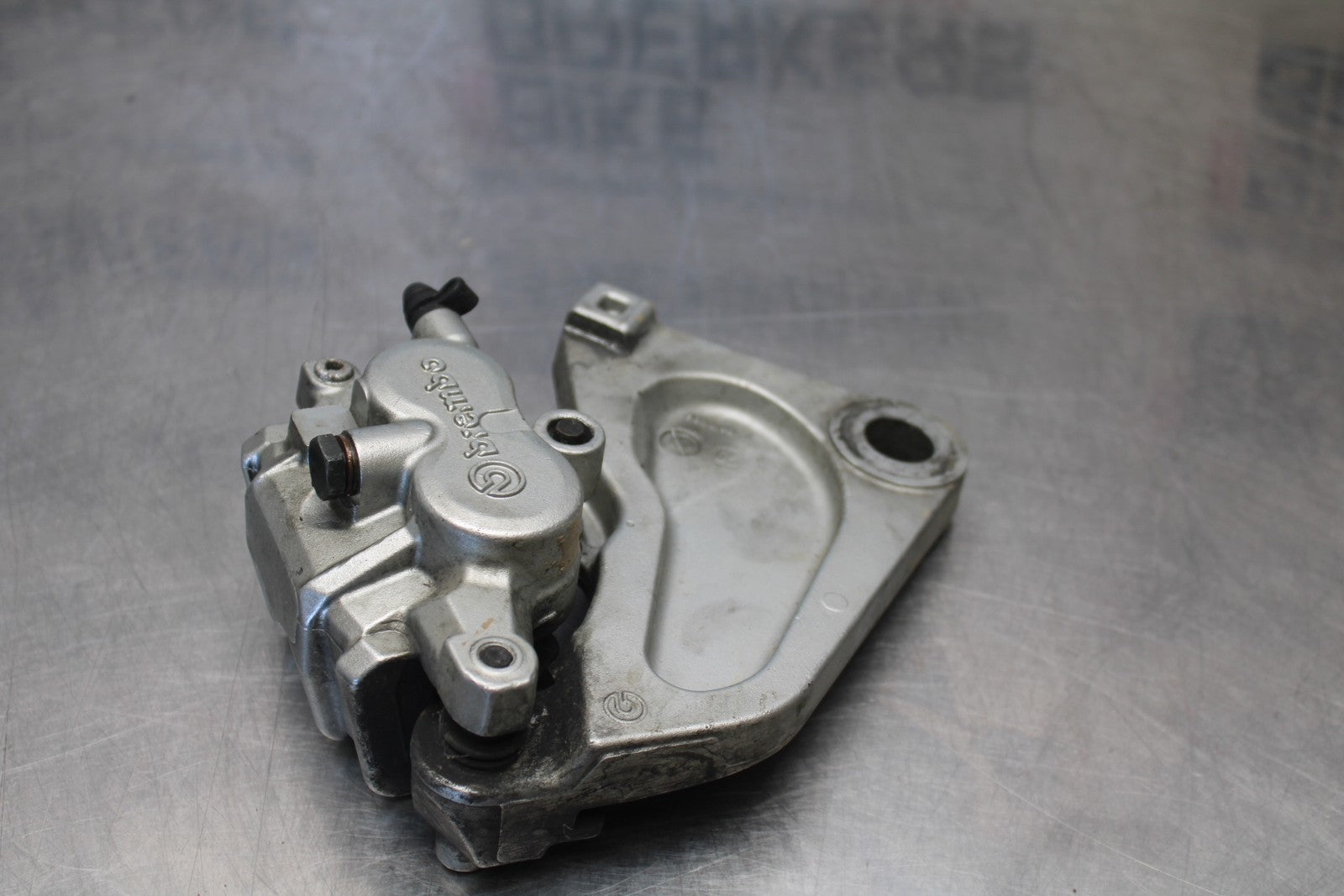 05-06 VICTORY KINGPIN DELUXE REAR BACK BRAKE CALIPER W MOUNT BRACKET BB195