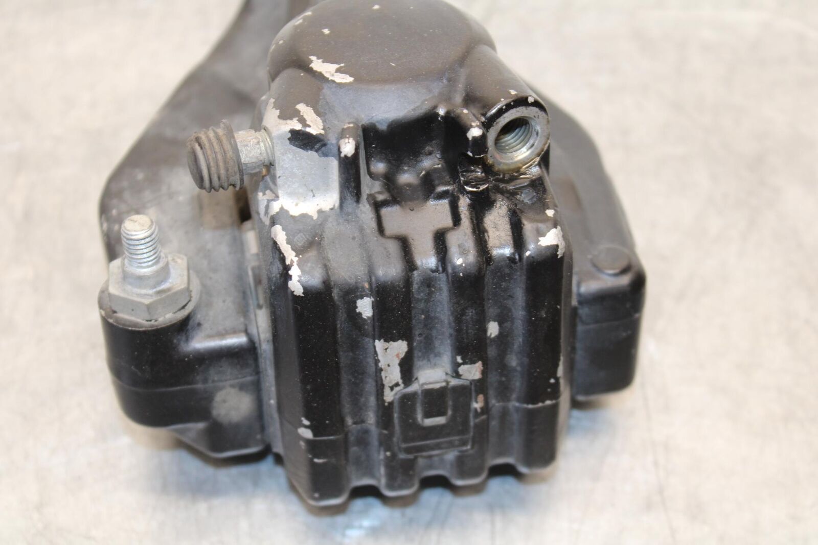 1977 Yamaha XS750 REAR BACK BRAKE CALIPER W MOUNT BRACKET BB554