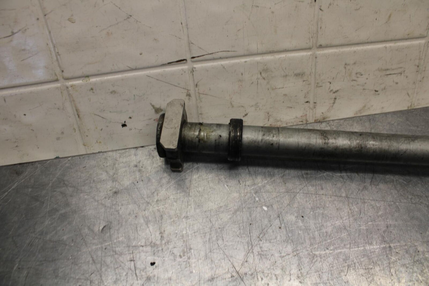 06-07 HONDA CBR1000RR REAR AXLE  WHEEL RIM PIVOT BOLT AXEL 42301-MEL-000  BB75