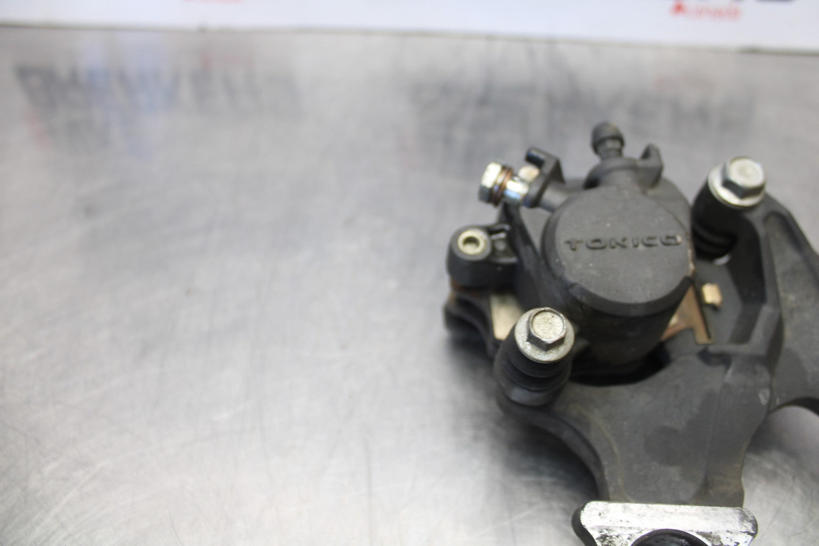 07 SUZUKI GSXR1000 REAR BACK BRAKE CALIPER W MOUNT BRACKET BB770