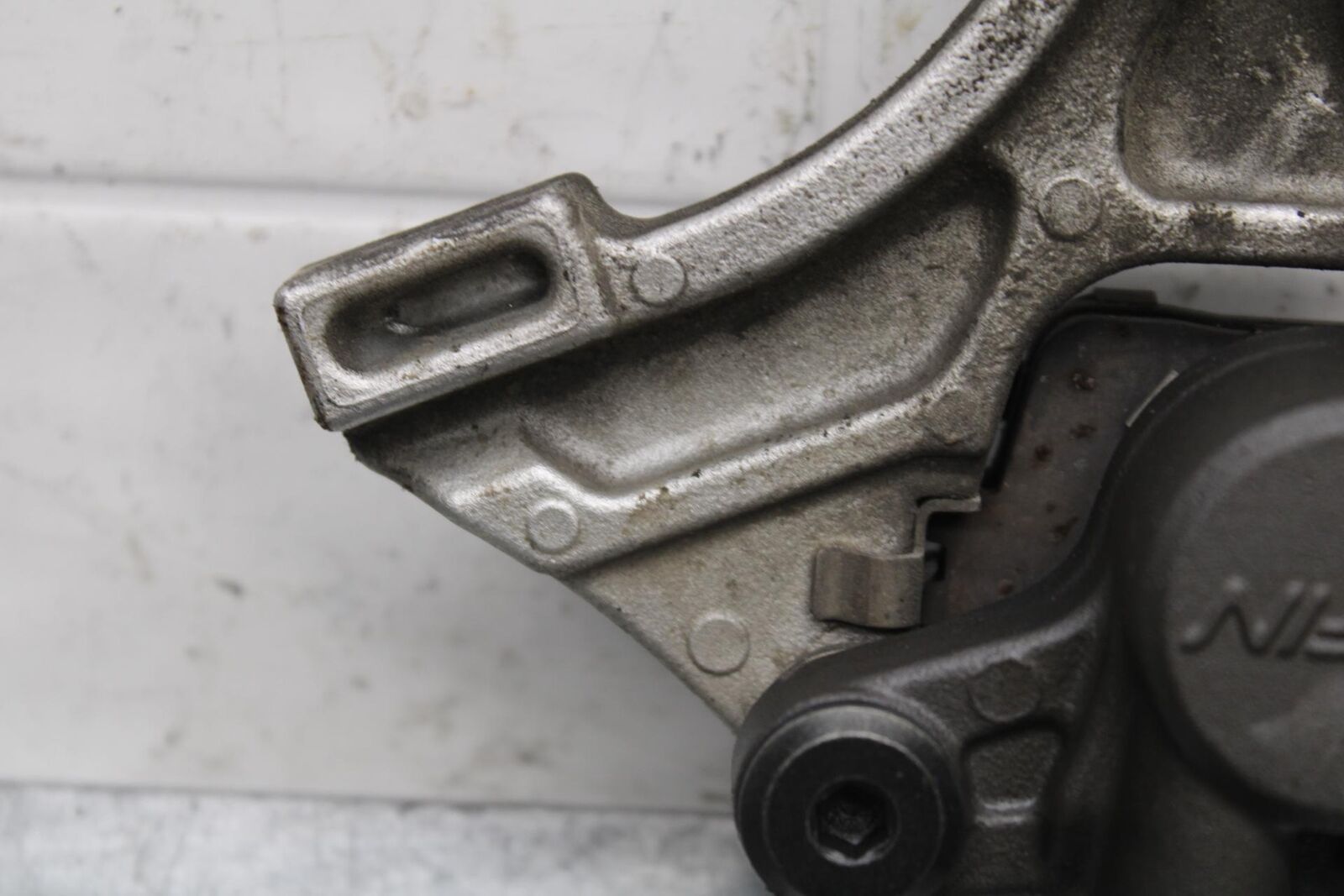 2007 Honda CBR600RR REAR BRAKE CALIPER W MOUNT BRACKET 43150-MFJ-D01 BB596