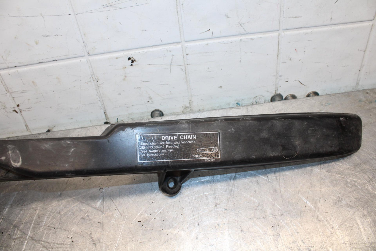 05-06 HONDA CBR600RR REAR BACK DRIVE CHAIN GUARD COVER SHIELD BB444