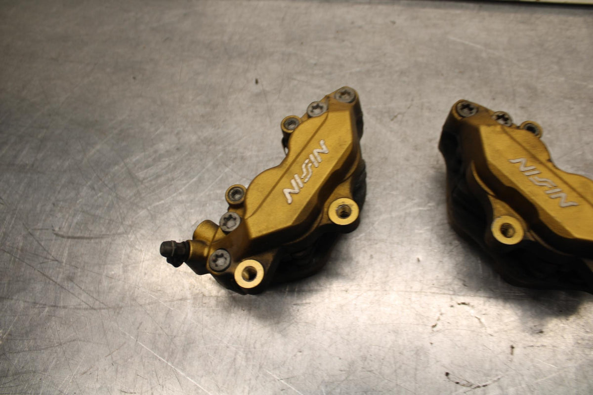 03-04 HONDA CBR600RR RIGHT LEFT FRONT BRAKE CALIPER SET PAIR CALIPERS BB614