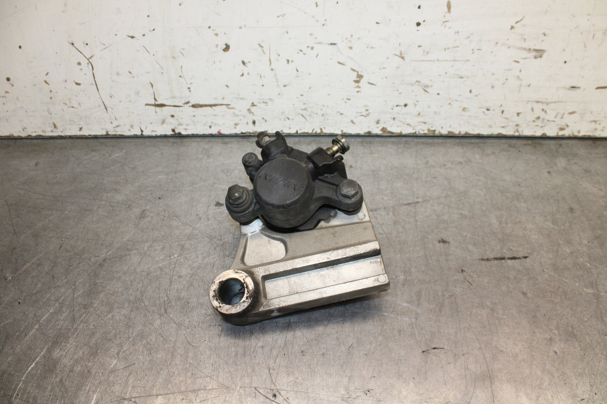 03-04 TRIUMPH DAYTONA 600 REAR BACK BRAKE CALIPER W MOUNT BRACKET BB745
