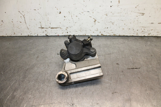 03-04 TRIUMPH DAYTONA 600 REAR BACK BRAKE CALIPER W MOUNT BRACKET BB745