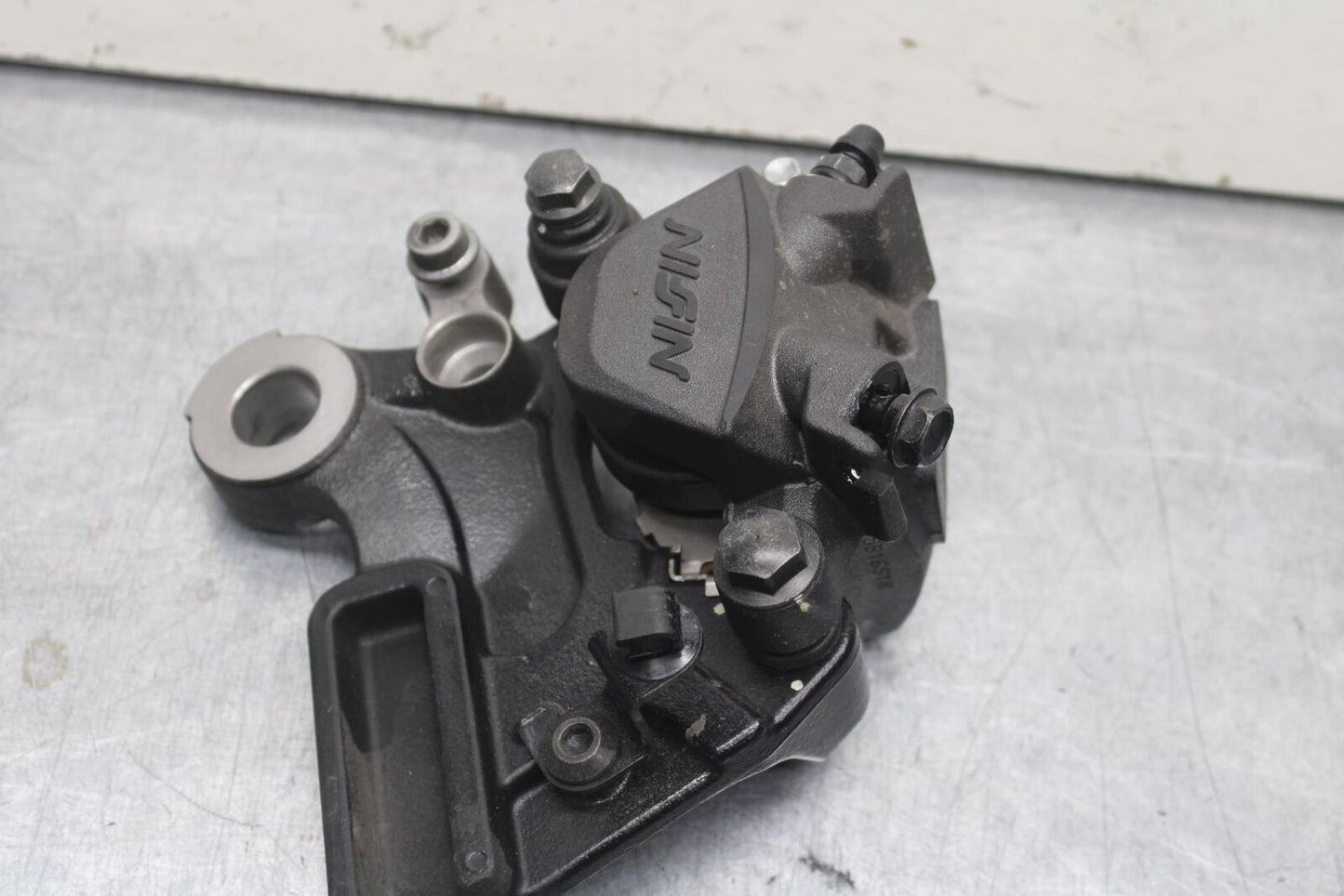 12-17 KAWASAKI ER-6N Z650 REAR BACK BRAKE CALIPER W MOUNT BRACKET BB607