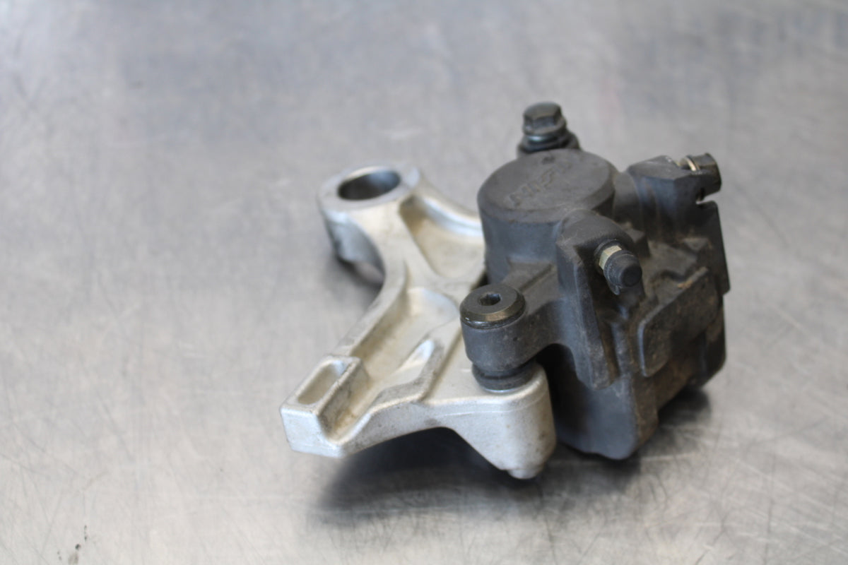 05-06 HONDA CBR600RR REAR BACK BRAKE CALIPER W MOUNT BRACKET BB159