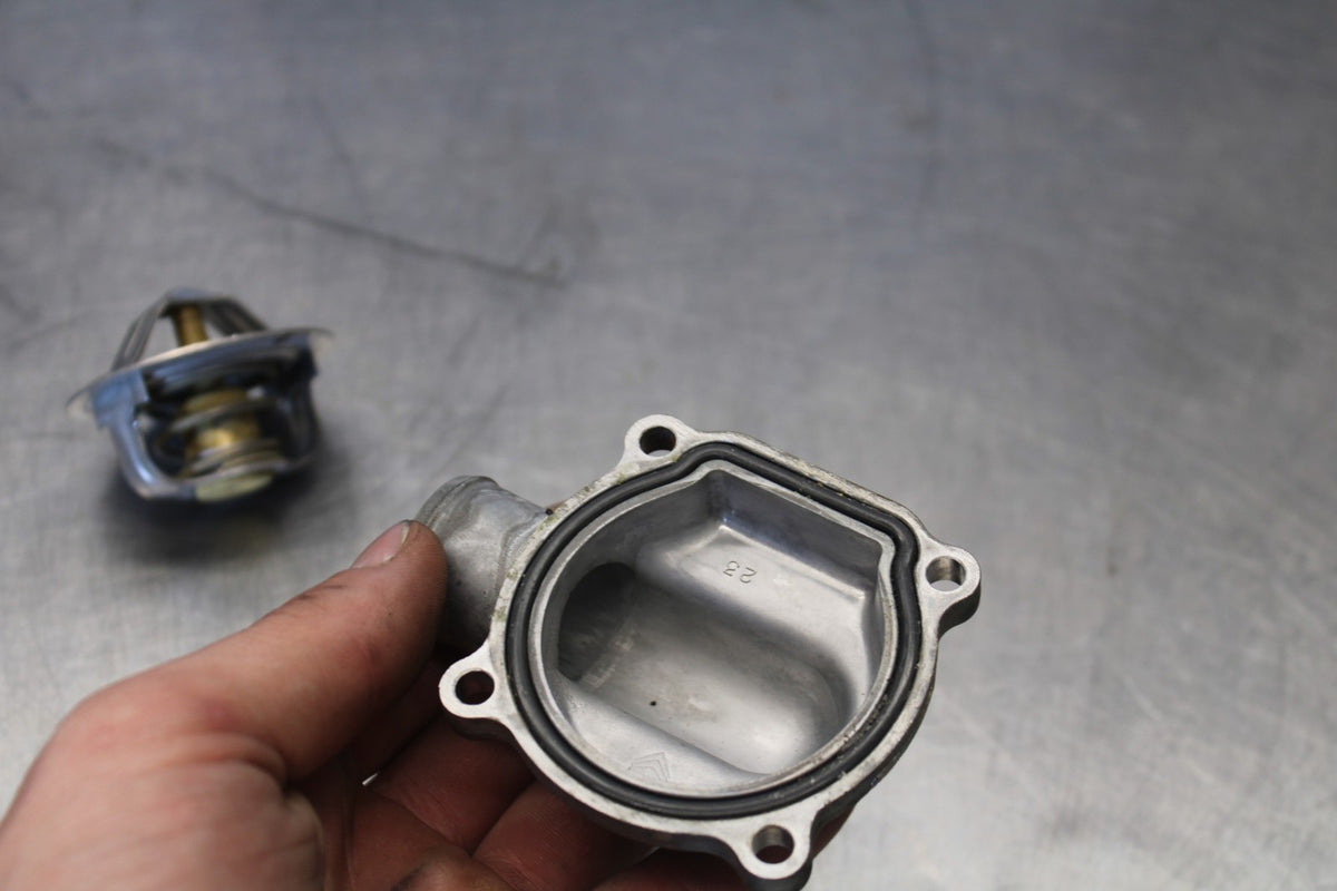 20-22 KAWASAKI NINJA ZX6R THERMOSTAT W HOUSING ASSEMBLY BB884