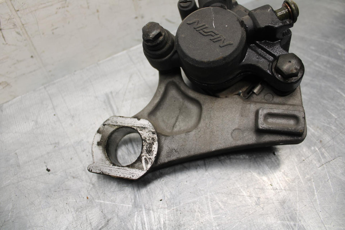 04-06 YAMAHA YZF R1 REAR BACK BRAKE CALIPER W MOUNT BRACKET BB491