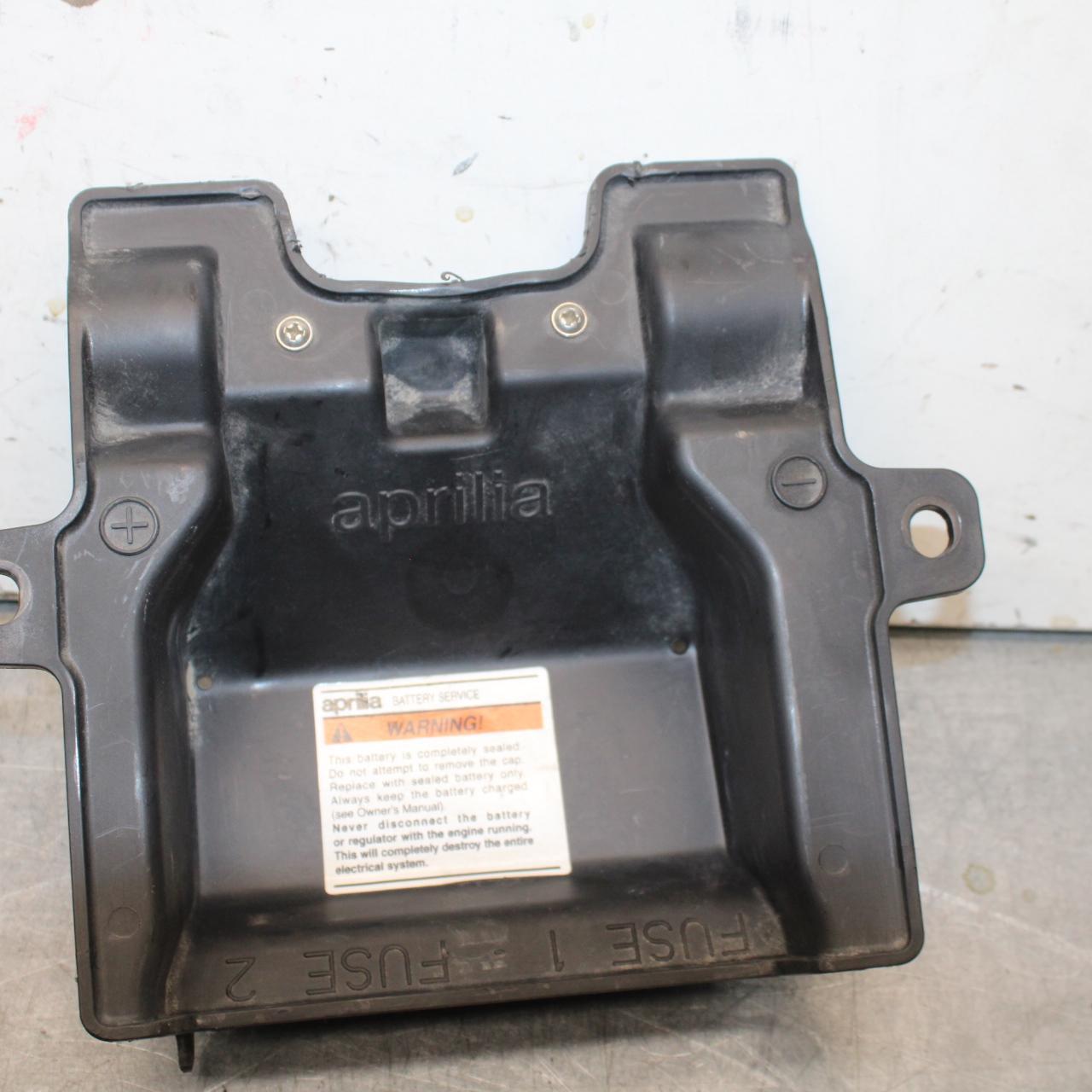 20-23 APRILIA RS660 RBATTERY TRAY PLASTIC BB643