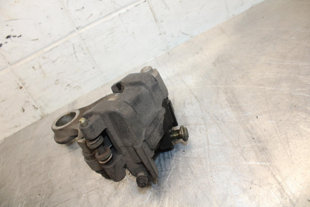 04-06 YAMAHA YZF R1 REAR BACK BRAKE CALIPER W MOUNT BRACKET BB491