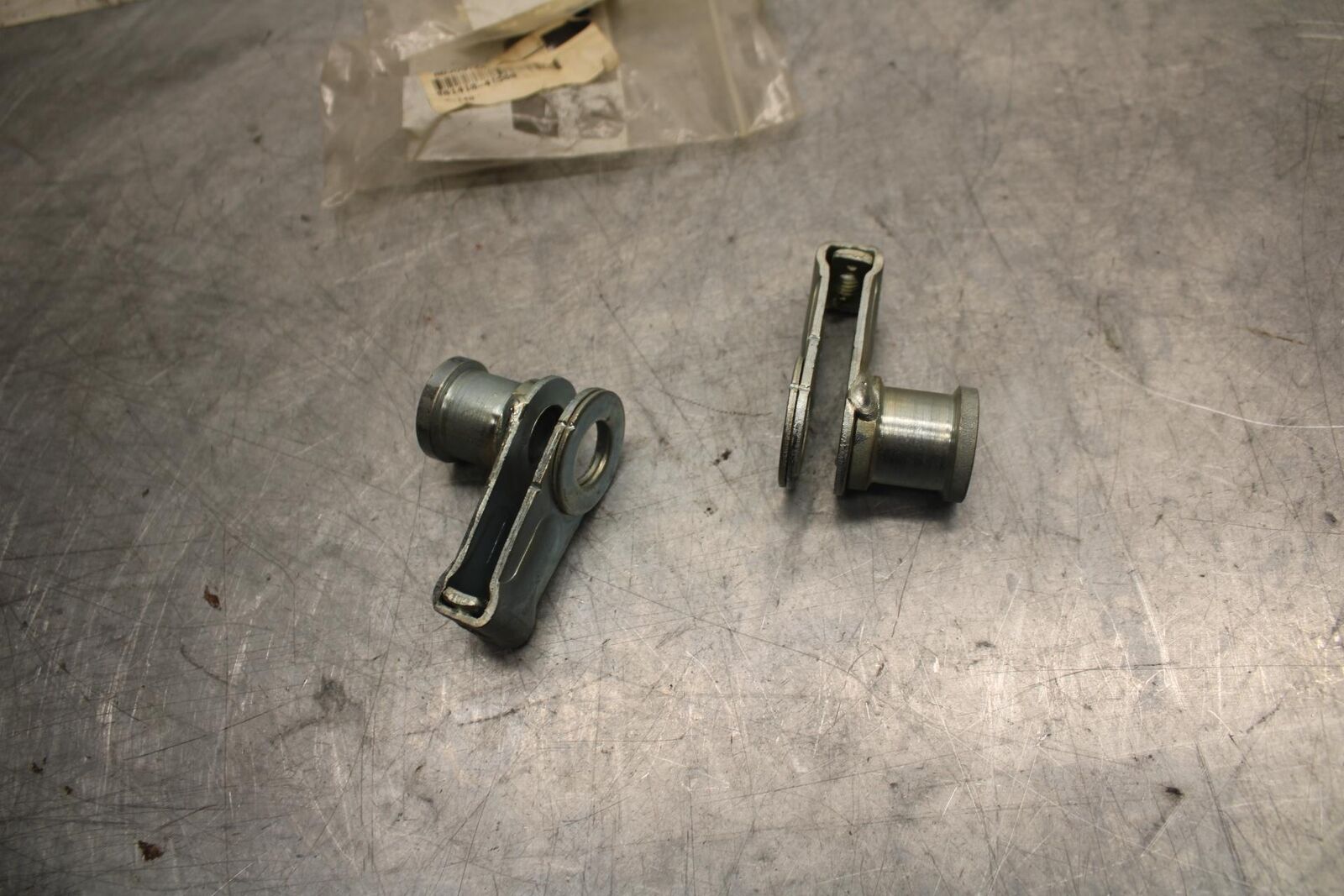 1978 Suzuki PE175  SWINGARM CHAIN TENSIONER BRACKETS 61410-41500 BB33