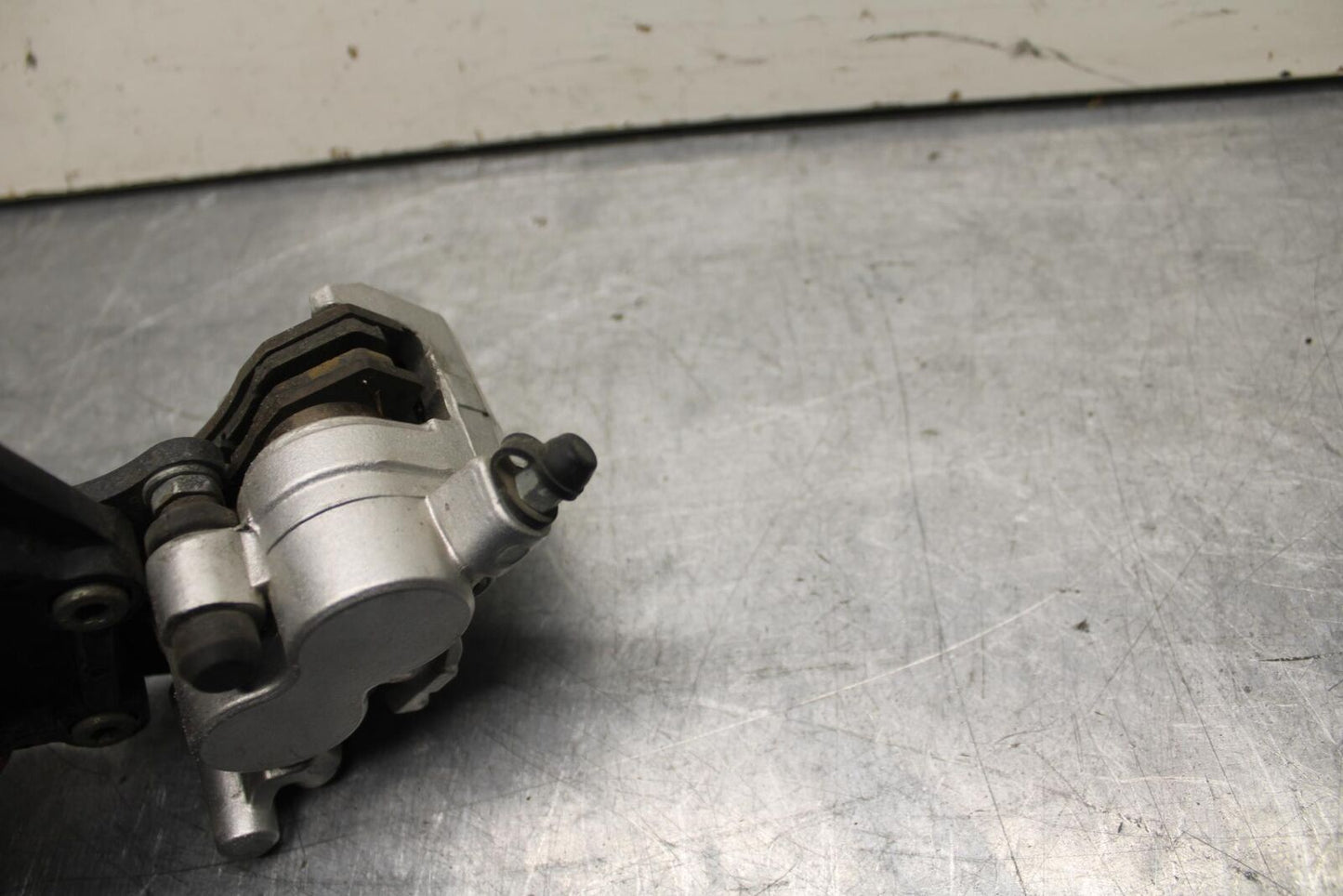 08-12 KAWASAKI NINJA 250R EX250J REAR BACK BRAKE CALIPER W MOUNT BRACKET BB612