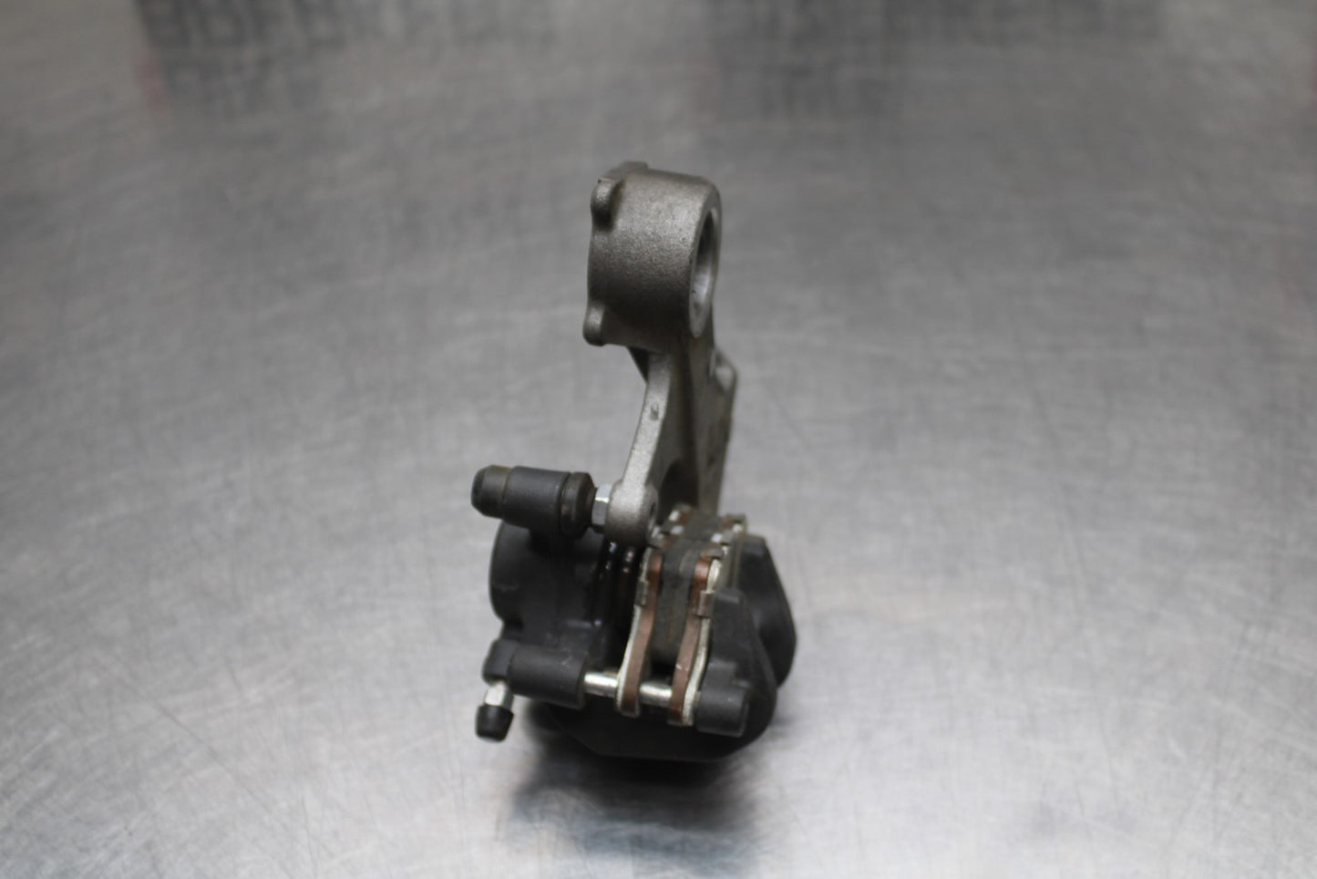 07 SUZUKI GSXR1000 REAR BACK BRAKE CALIPER W MOUNT BRACKET BB770