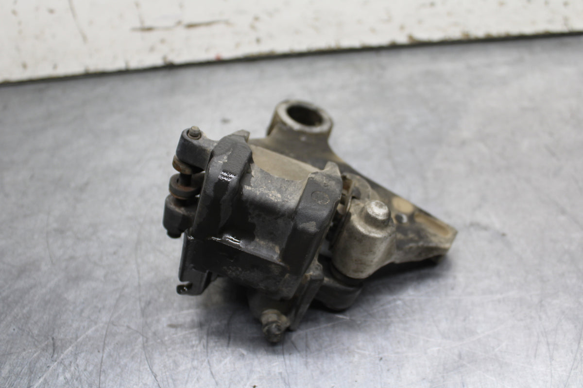 05-06 HONDA CBR600RR REAR BACK BRAKE CALIPER W MOUNT BRACKET BB739