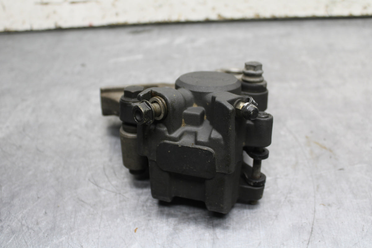 01-06 HONDA CBR600F4I REAR BACK BRAKE CALIPER W MOUNT BRACKET BB115