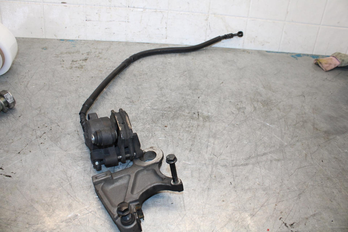 08-16 YAMAHA YZF R6 REAR BACK BRAKE CALIPER W MOUNT BRACKET BB431