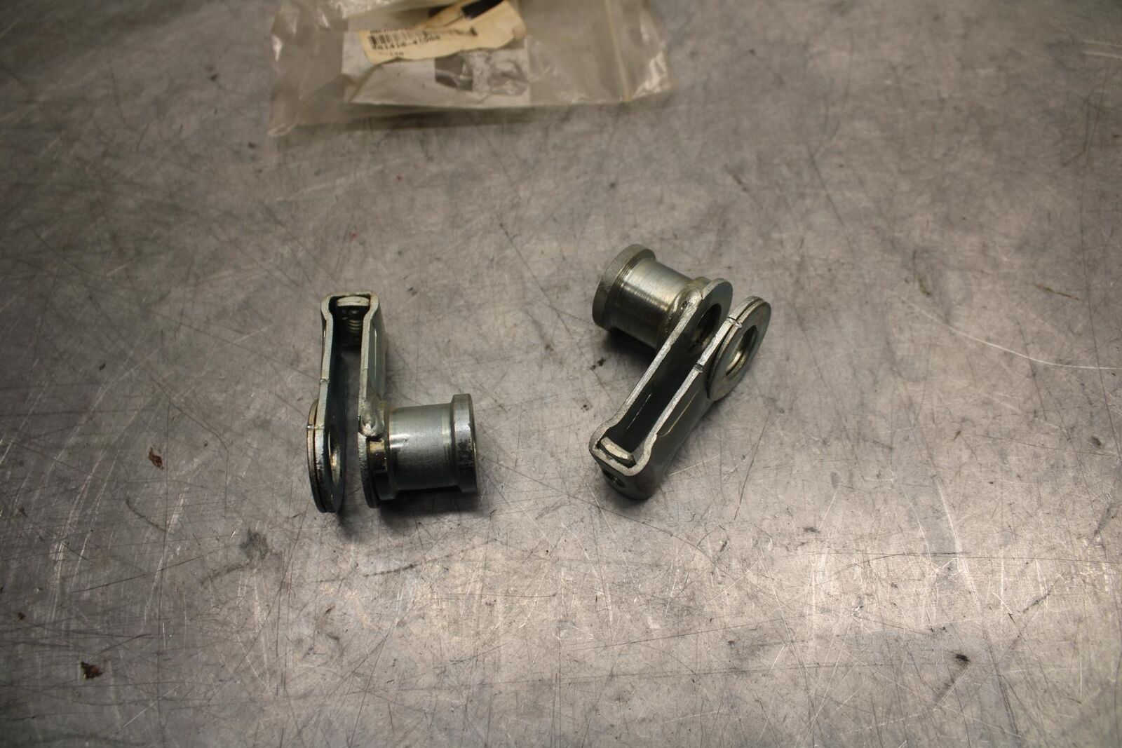 1978 Suzuki PE175  SWINGARM CHAIN TENSIONER BRACKETS 61410-41500 BB33