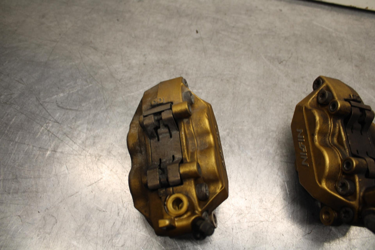 03-04 HONDA CBR600RR RIGHT LEFT FRONT BRAKE CALIPER SET PAIR CALIPERS BB614