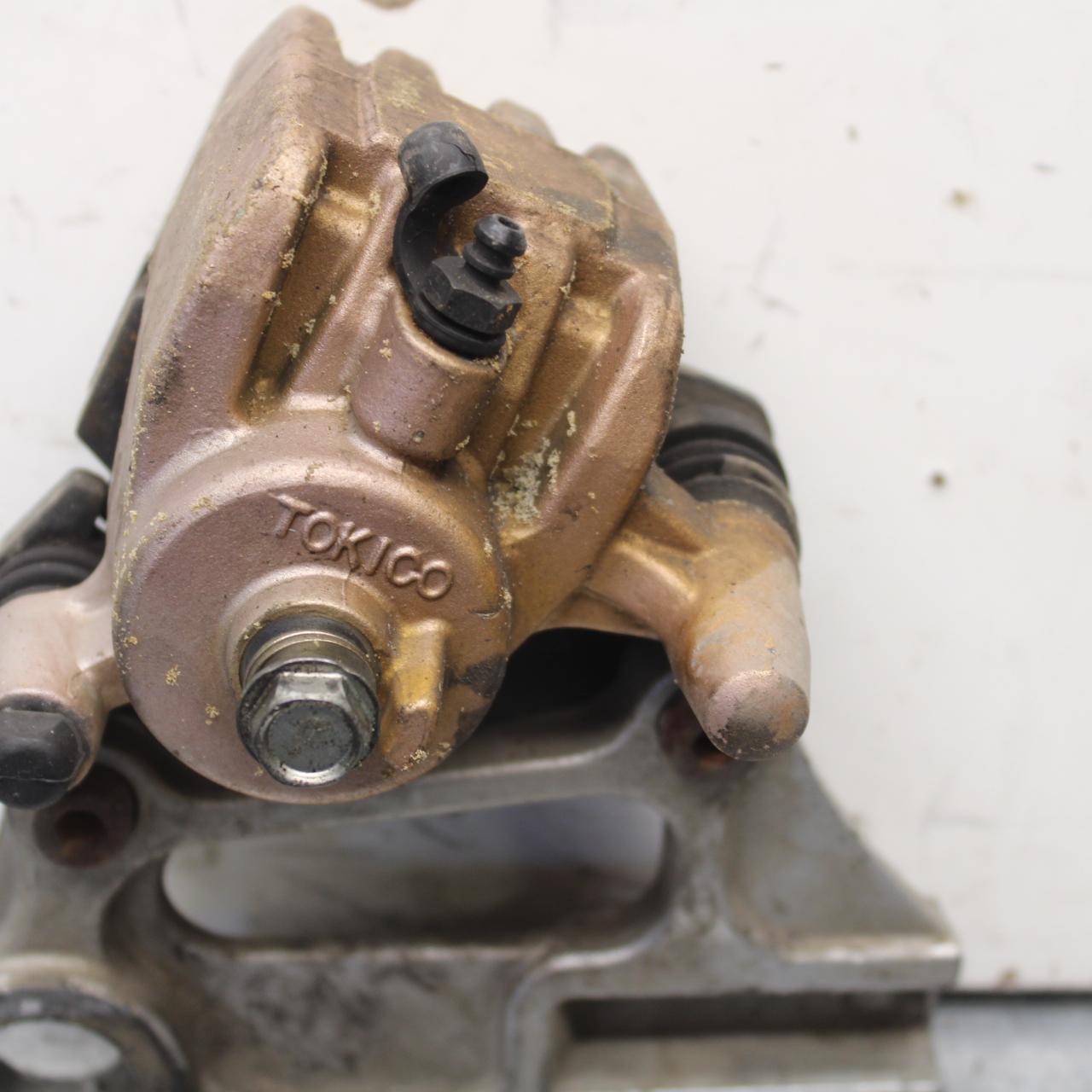 03-04 KAWASAKI NINJA ZX6RR REAR BACK BRAKE CALIPER W MOUNT BRACKET BB105