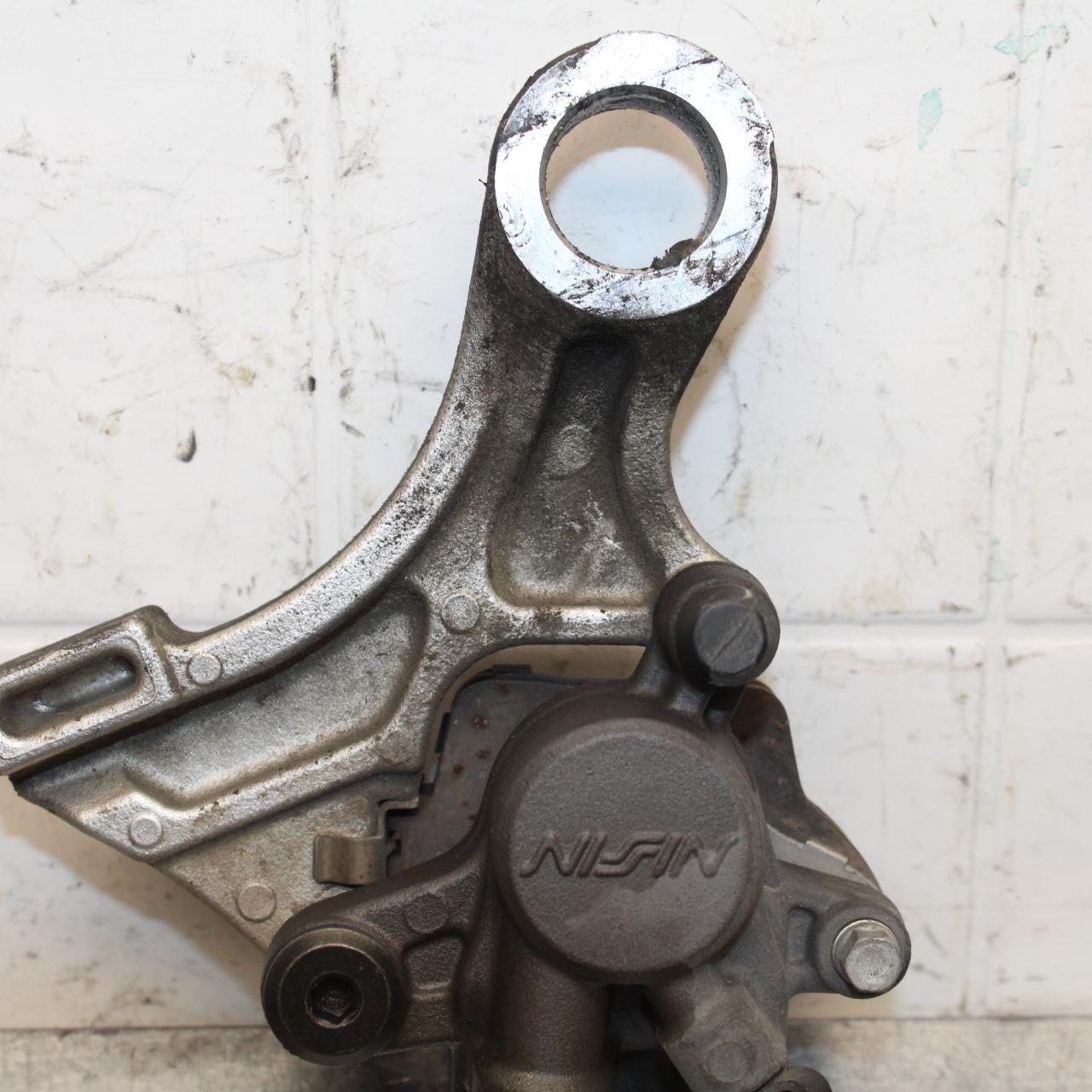 2007 Honda CBR600RR REAR BRAKE CALIPER W MOUNT BRACKET 43150-MFJ-D01 BB596