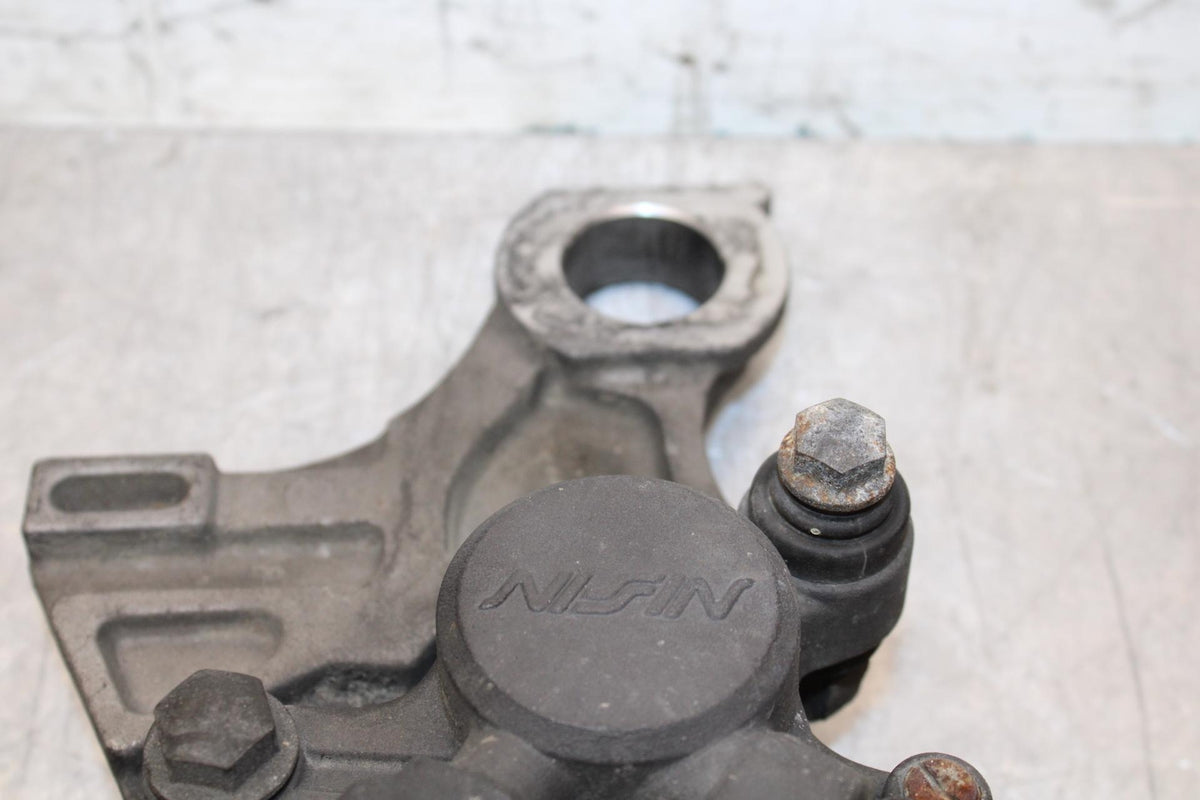2005 Yamaha YZF R6 REAR BRAKE CALIPER W MOUNT BRACKET 5SL-2580W-00-00 BB62
