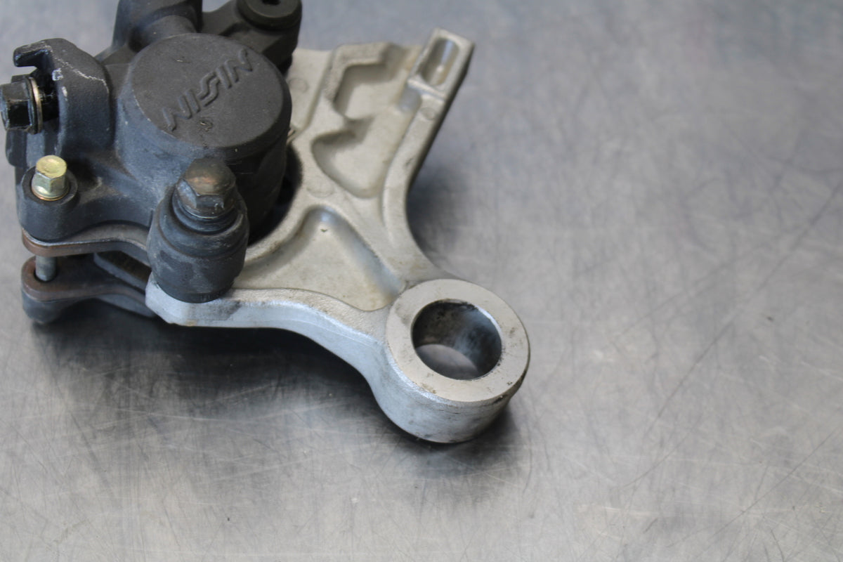 05-06 HONDA CBR600RR REAR BACK BRAKE CALIPER W MOUNT BRACKET BB159