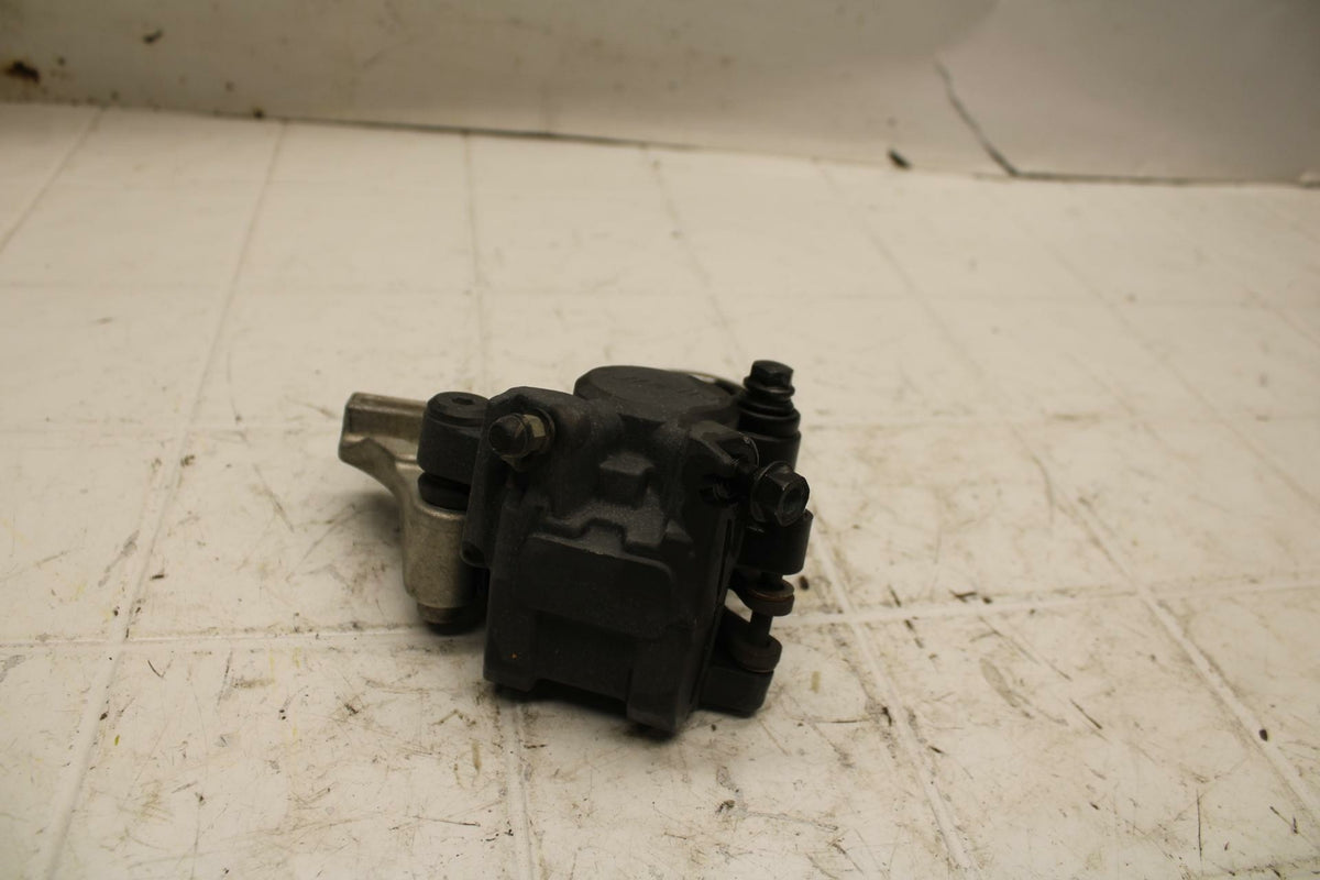 05-06 HONDA CBR600RR REAR BACK BRAKE CALIPER W MOUNT BRACKET BB399