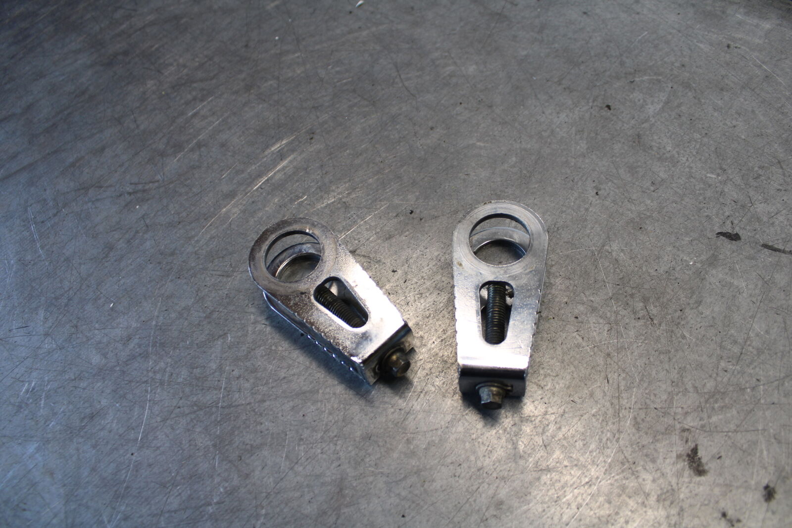 03-04 HONDA CBR600RR SWINGARM CHAIN TENSIONER ADJUSTMENT BRACKETS BB661