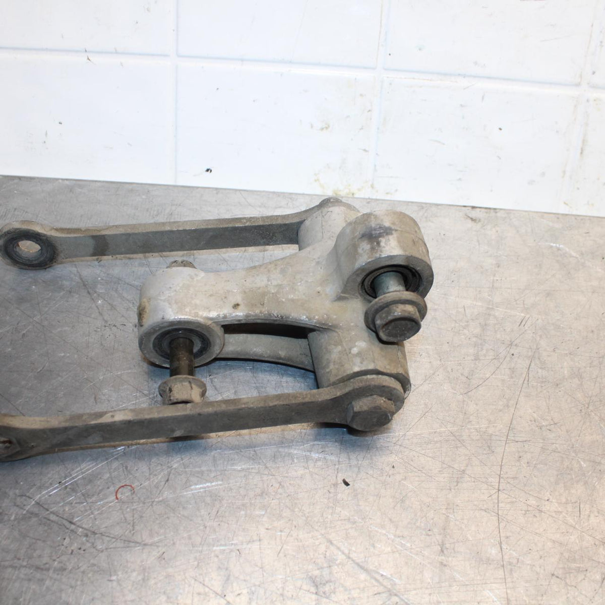 89-90 YAMAHA FZR600 REAR DOGBONE SHOCK LINKAGE LINK BB76
